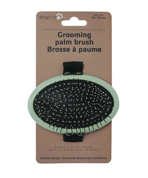 Dexypaws Grooming Palm Brush with Metal Pins for Pets, in packaging.