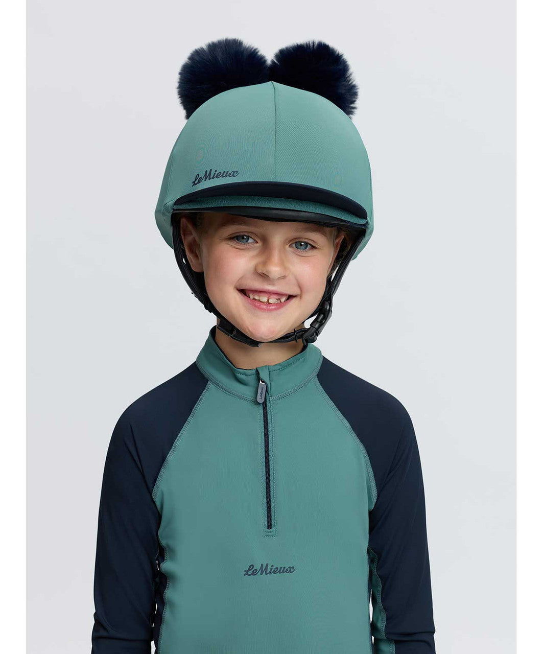 LeMieux Mini Double Pom Pom Hat Silk FW26, Navy/Aloe, front.
