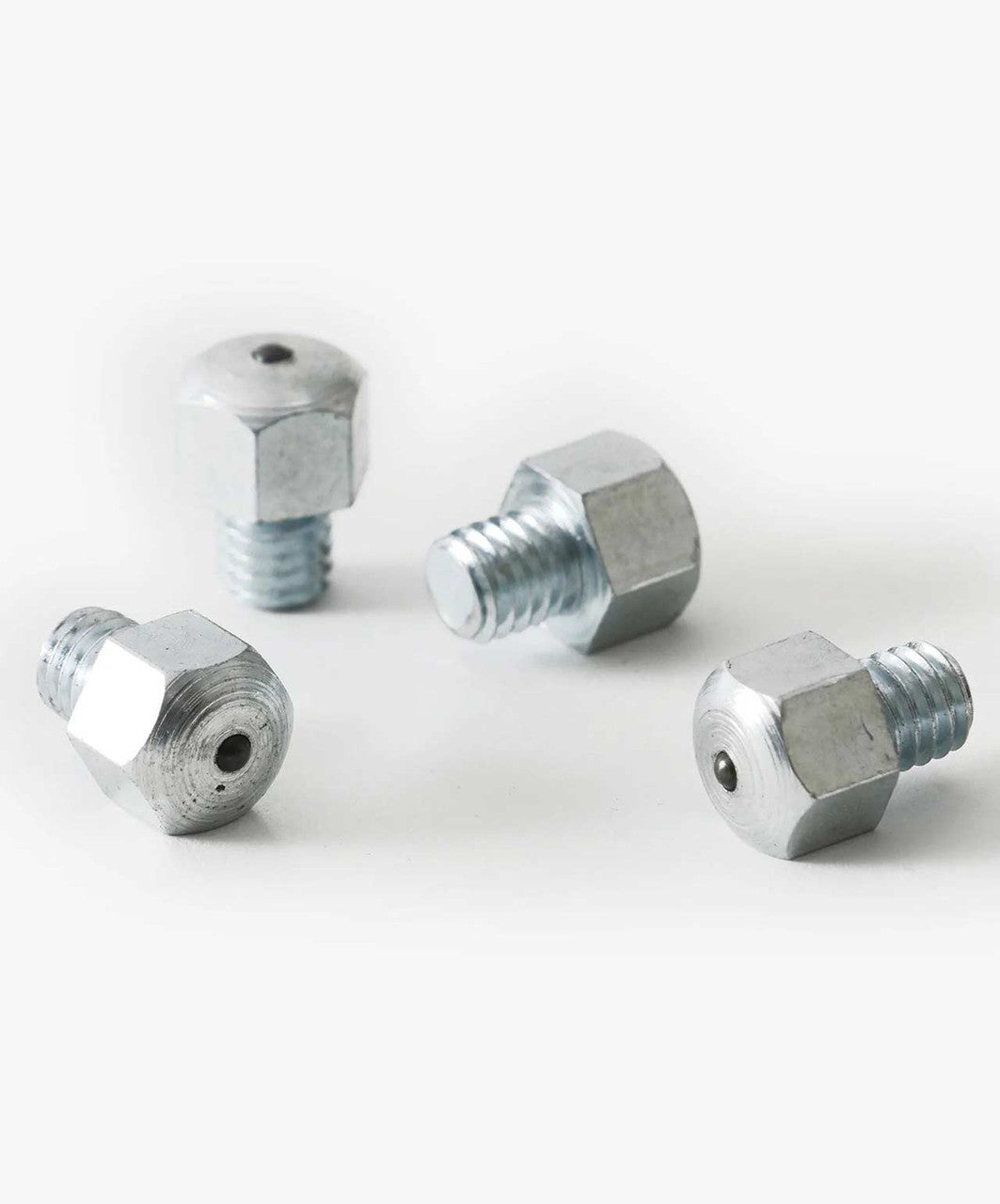 Set of four metal screw in studs for soft ground.